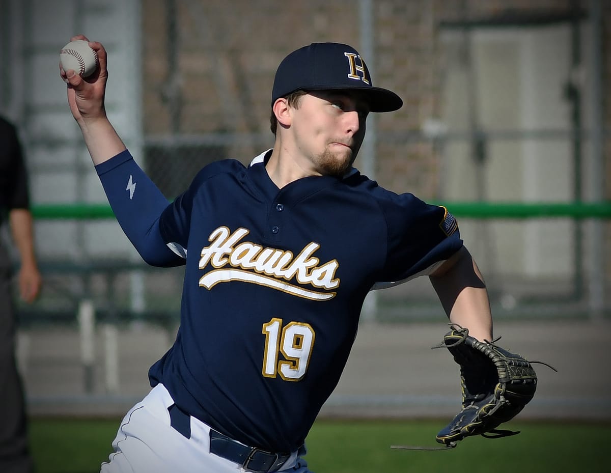 Hawks split doubleheader at Wade