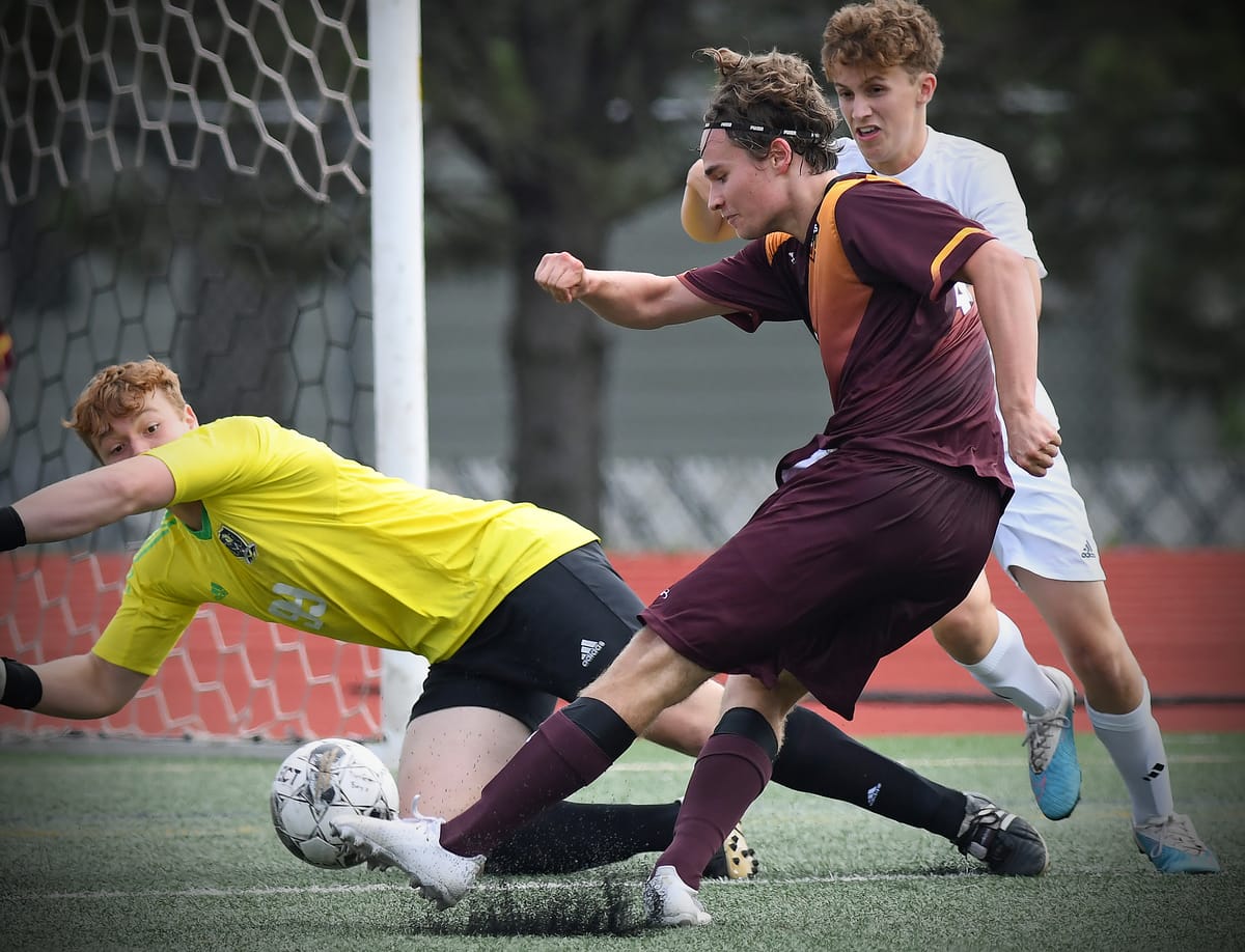 Hunters lose boys soccer opener